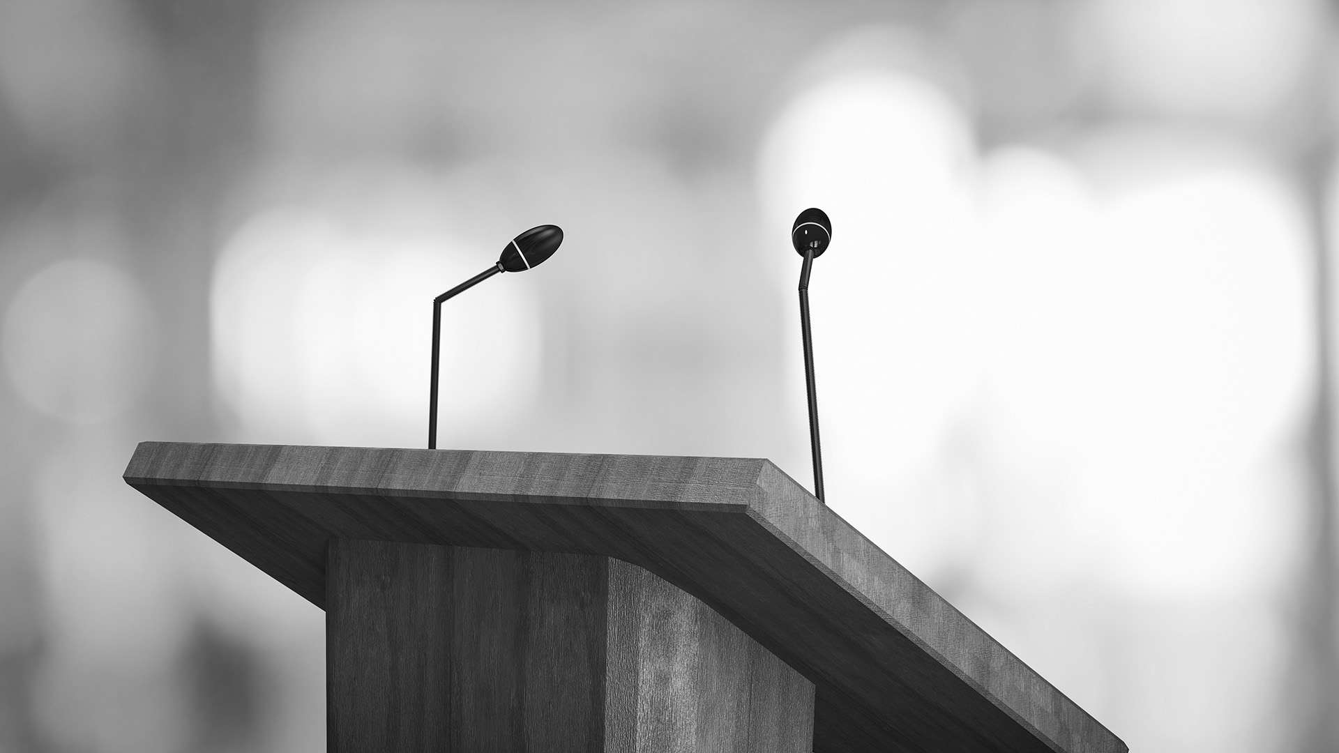 wooden podium with microphones