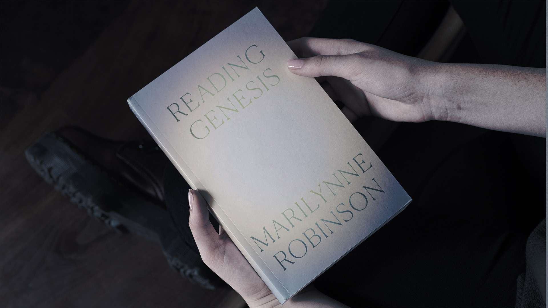 ReadinGenesis BookInHand Mockup copy